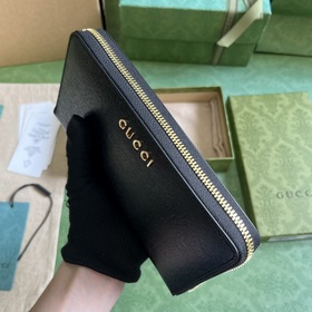 Длинный кошелек с логотипом Gucci, выполненным рукописным шрифтом