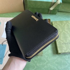 Длинный кошелек с логотипом Gucci, выполненным рукописным шрифтом