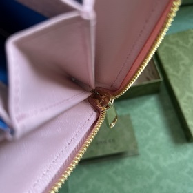 Длинный кошелек с логотипом Gucci, выполненным рукописным шрифтом