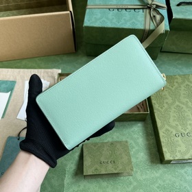 Длинный кошелек с логотипом Gucci, выполненным рукописным шрифтом