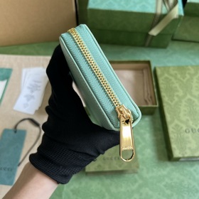 Длинный кошелек с логотипом Gucci, выполненным рукописным шрифтом