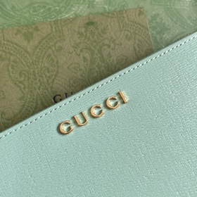 Длинный кошелек с логотипом Gucci, выполненным рукописным шрифтом