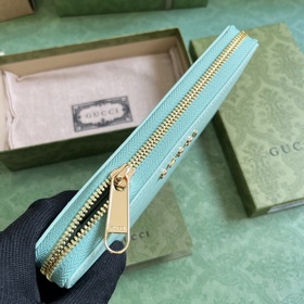 Длинный кошелек с логотипом Gucci, выполненным рукописным шрифтом