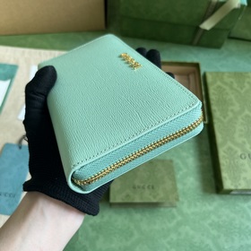 Длинный кошелек с логотипом Gucci, выполненным рукописным шрифтом