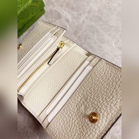 Новинка от Gucci! Карман для карт с камуфляжным рисунком и кожа и