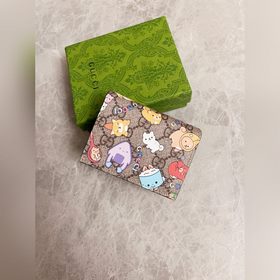 Новинка от Gucci! Карман для карт с камуфляжным рисунком и кожа и