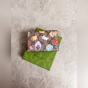 Новинка от Gucci! Карман для карт с камуфляжным рисунком и кожа и