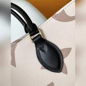 M46912 Топ-модель. В данной сумке OnTheGo среднего размера мотив 