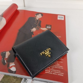 Дамский кожаный кошелек Prada, модель 1M0204, кожа с крестообразн