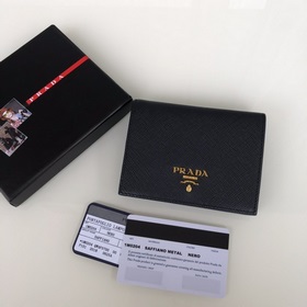 Дамский кожаный кошелек Prada, модель 1M0204, кожа с крестообразн