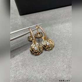 Материал V-Gold 8690180 Серьги Chanel с золотыми камелиями. Какая