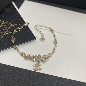 Chanel браслет с бриллиантами виде цветов и листьев