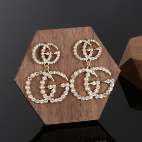 Серьги Gucci. Элитные, созданы для того, чтобы выглядели великоле