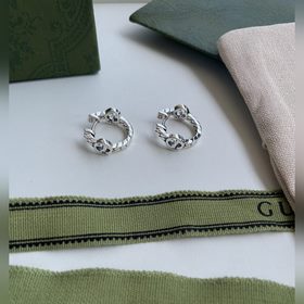 Новинка Gucci Серебряные серьги-клипсы с двойным кольцом G