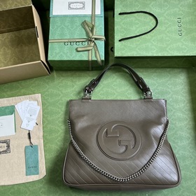 Средняя сумка-тоут из серии Gucci Blondie. Сумкиз серии Gucci Blo