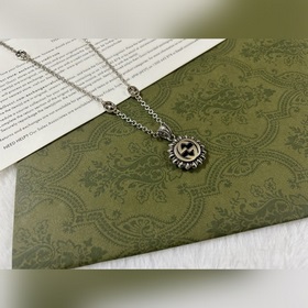 Gucci Двойное G подвесное ожерелье с подвеской виде подсолнуха Дл
