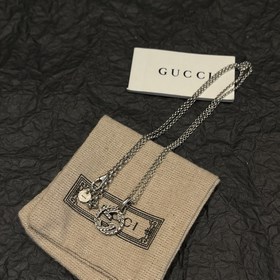 Сцепление Gucci Маленькое ожерелье с гравировкой Double G