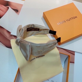 LV Louis Vuitton представляет новую модную заколку виде бантика. 