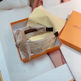 LV Louis Vuitton представляет новую модную заколку виде бантика. 