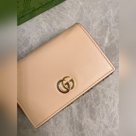 Новейший кожаный кошелек Gucci изготовлен из бежевой и черной тка