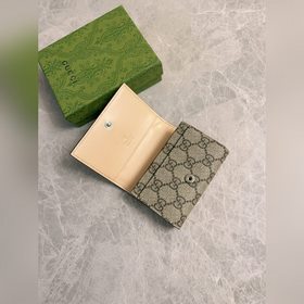 Новейший кожаный кошелек Gucci изготовлен из бежевой и черной тка