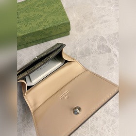 Новейший кожаный кошелек Gucci изготовлен из бежевой и черной тка