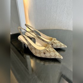 Новая модель GUcc с пряжкой виде конской уздечки от G в 2025 году