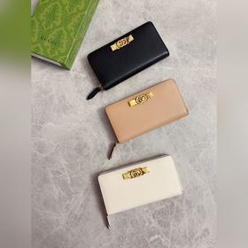 Новейшая модель Gucci — кошелек с двойным G-образным замком и бан