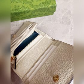 Новинка от Gucci! Карман для карт с камуфляжным рисунком и кожа и