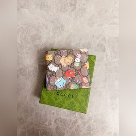 Новинка от Gucci! Короткий кожаный кошелек с камуфляжным рисунком