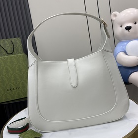 Новинка Средняя сумка через плечо из серии Gucci Jackie. В коллек