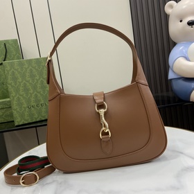 Новинка Небольшая сумка через плечо из серии Gucci Jackie. Эта но