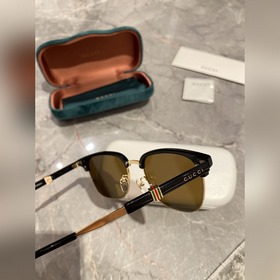 Новинка на официальном сайте Солнцезащитные очки Gucci для мужчи