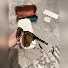 Новинка на официальном сайте Мужские солнцезащитные очки Gucci 