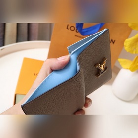 Короткий кошелек LV Vertical M81298 Абрикосовый Этот кошелек из 