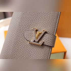 Короткий кошелек LV Vertical M81298 Абрикосовый Этот кошелек из 
