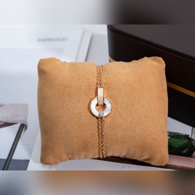 Браслет Bulgari BV с круглыми дисками, известный как «браслет с м