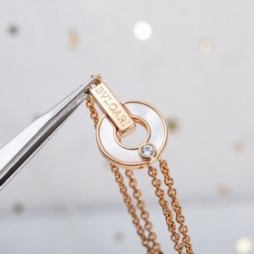 Браслет Bulgari BV с круглыми дисками, известный как «браслет с м