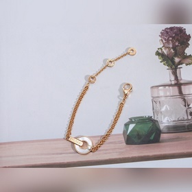 Браслет Bulgari BV с круглыми дисками, известный как «браслет с м