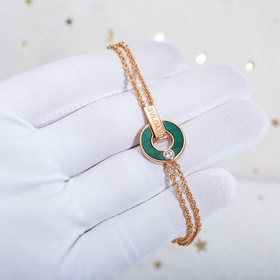 Браслет Bulgari BV с круглыми дисками, известный как «браслет с м
