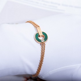 Браслет Bulgari BV с круглыми дисками, известный как «браслет с м