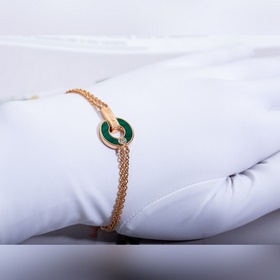 Браслет Bulgari BV с круглыми дисками, известный как «браслет с м