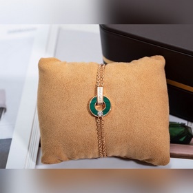 Браслет Bulgari BV с круглыми дисками, известный как «браслет с м