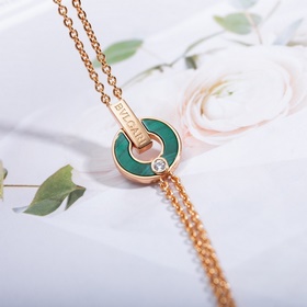 Браслет Bulgari BV с круглыми дисками, известный как «браслет с м