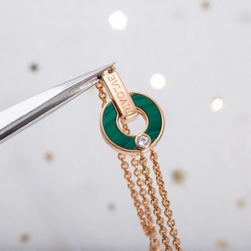 Браслет Bulgari BV с круглыми дисками, известный как «браслет с м