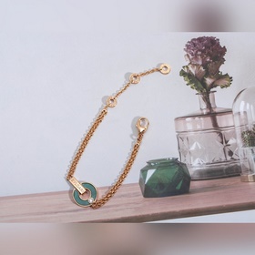 Браслет Bulgari BV с круглыми дисками, известный как «браслет с м
