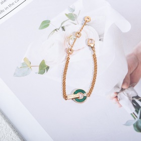 Браслет Bulgari BV с круглыми дисками, известный как «браслет с м