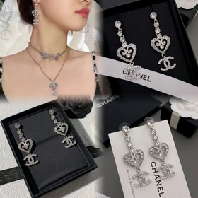 CHANEL 24K сережки с кисточками в форме сердца и двойным символом