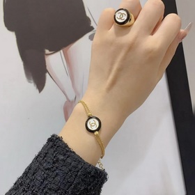 Chanel Черно-белые круглые пуговицы, браслет из смолы