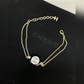 Chanel Черно-белые круглые пуговицы, браслет из смолы